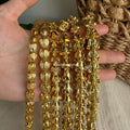 gold hawaiian beads