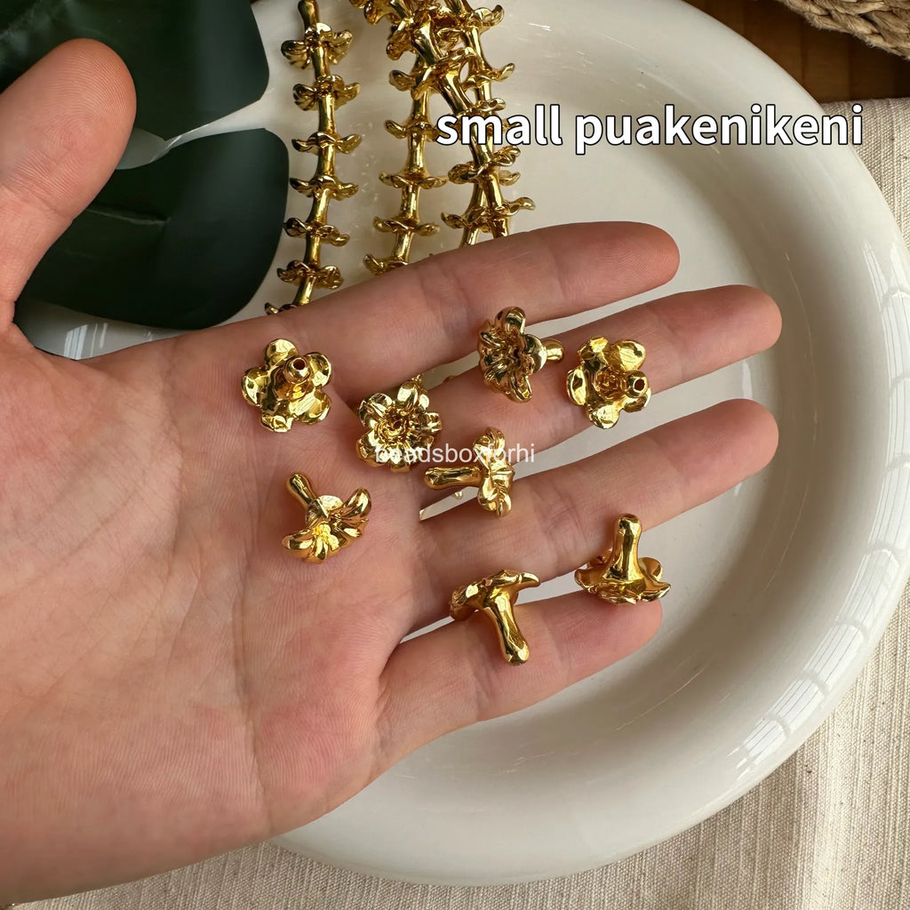 gold hawaiian beads