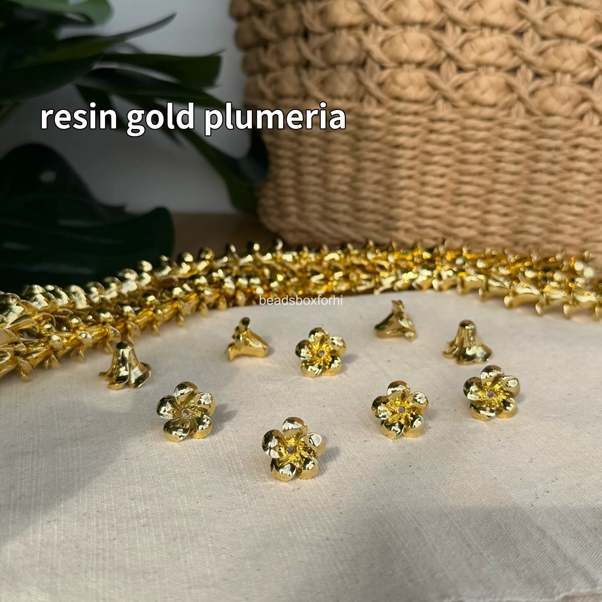 resin gold plumeria