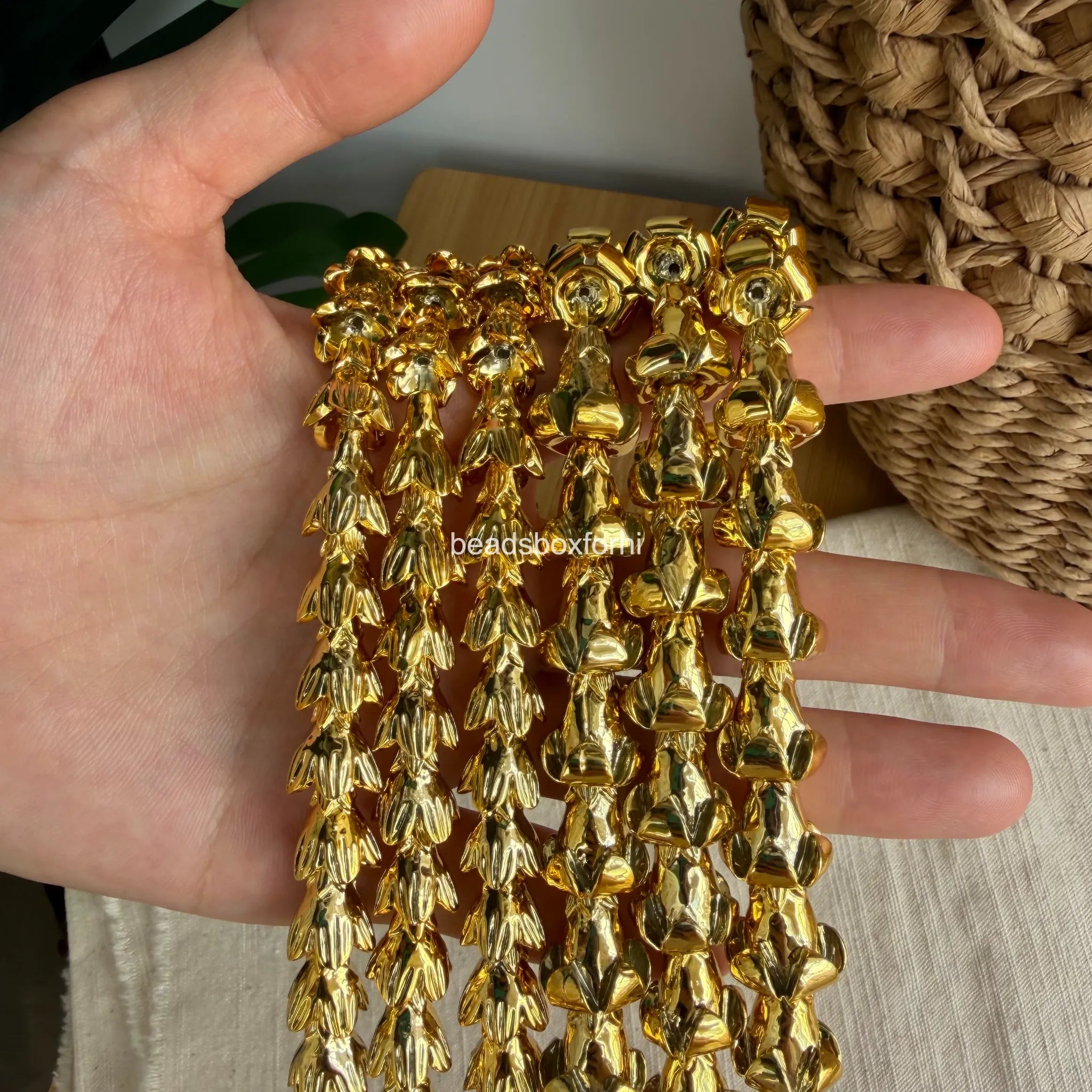 gold hawaiian beads