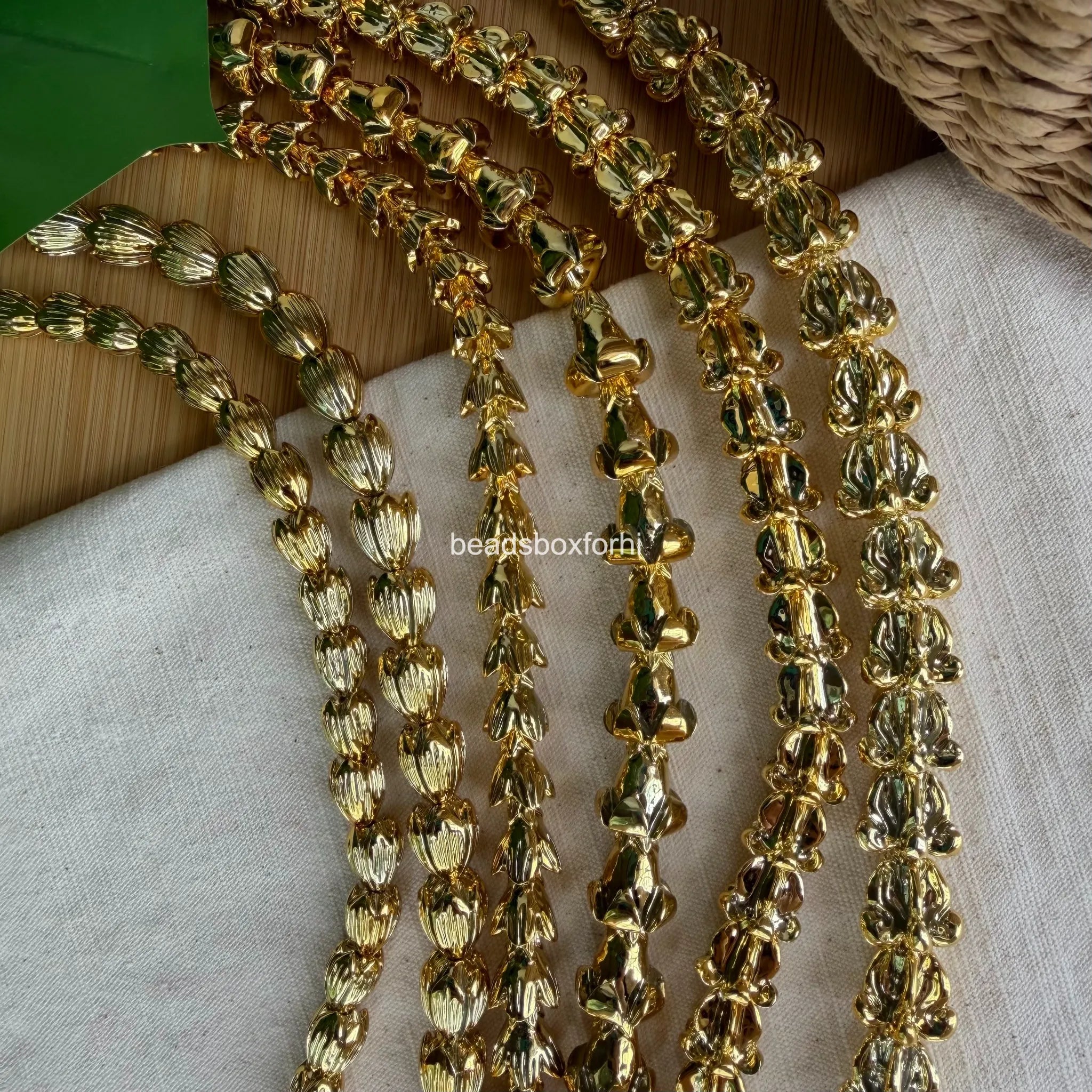 gold hawaiian beads