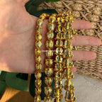 gold hawaiian beads