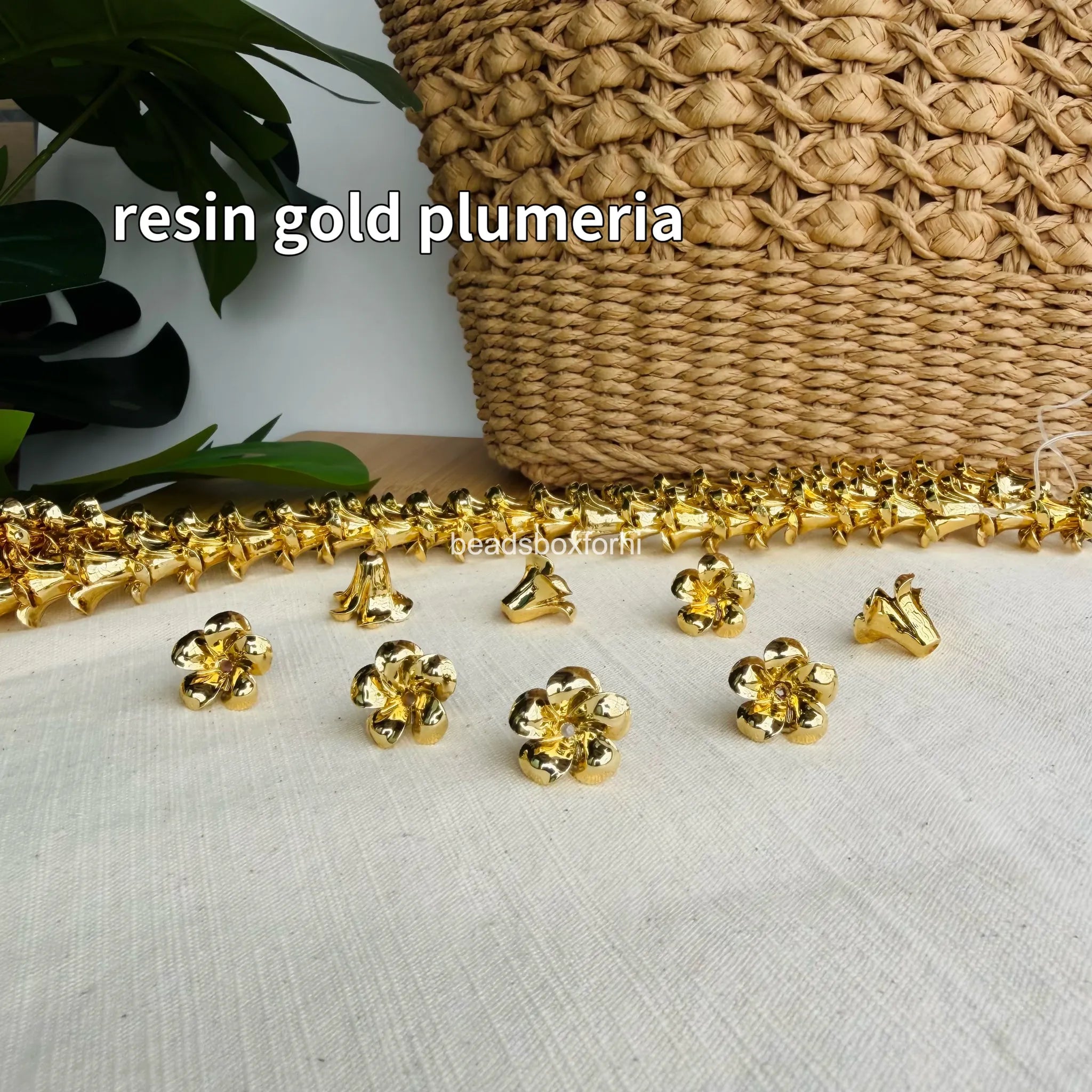 resin gold plumeria