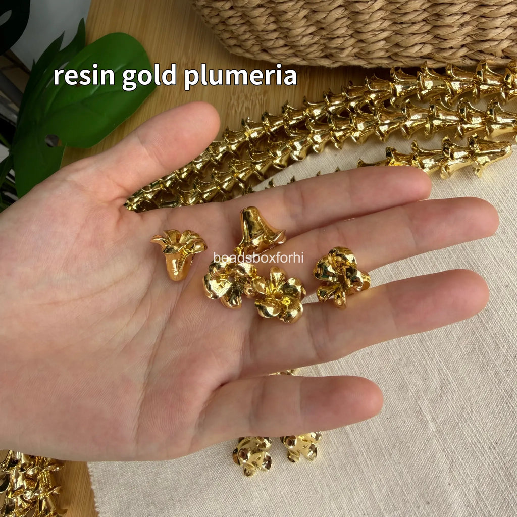 resin gold plumeria